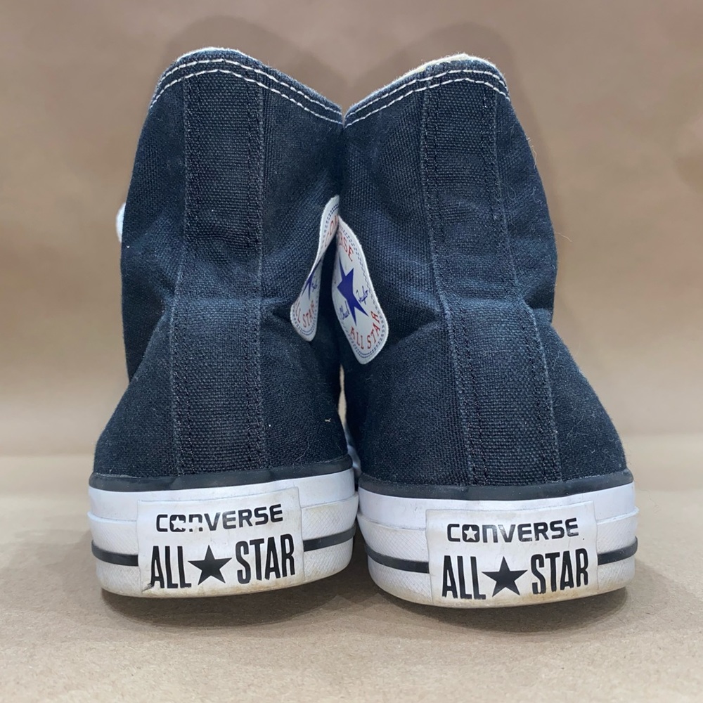 Black high top Converse. Size 10 women’s, 8 men’s.